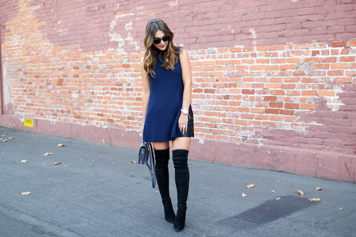 wearing navy and black