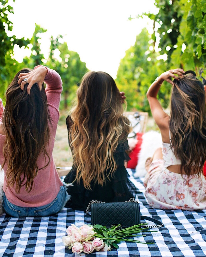 three girls with long brown hair