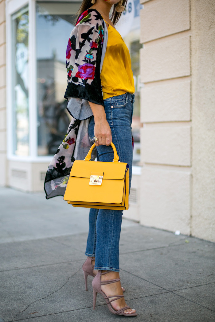 yellow top handle purse