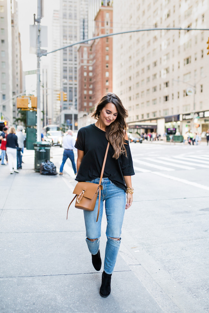 black tee and jeans