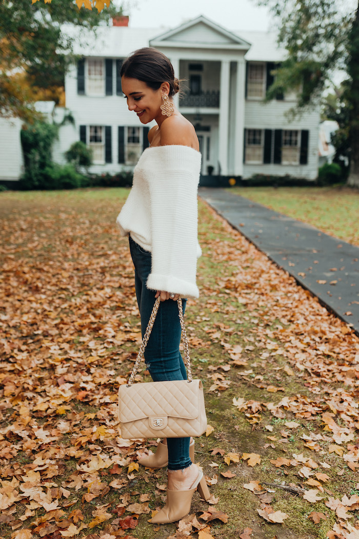 white fuzzy sweater