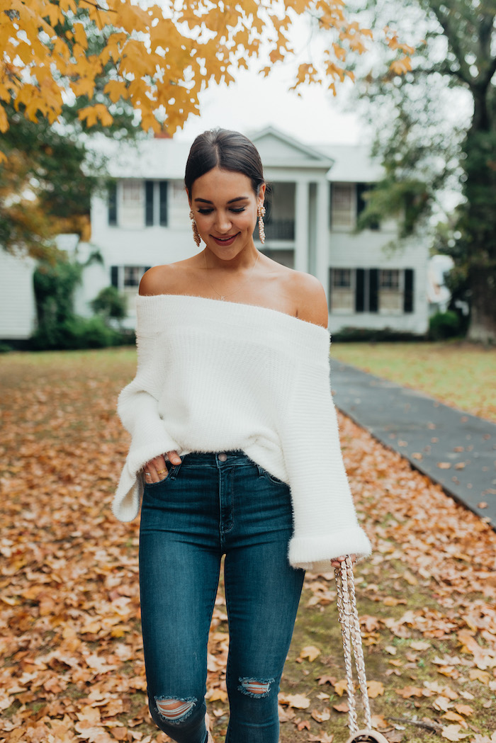 white bell sleeved sweater