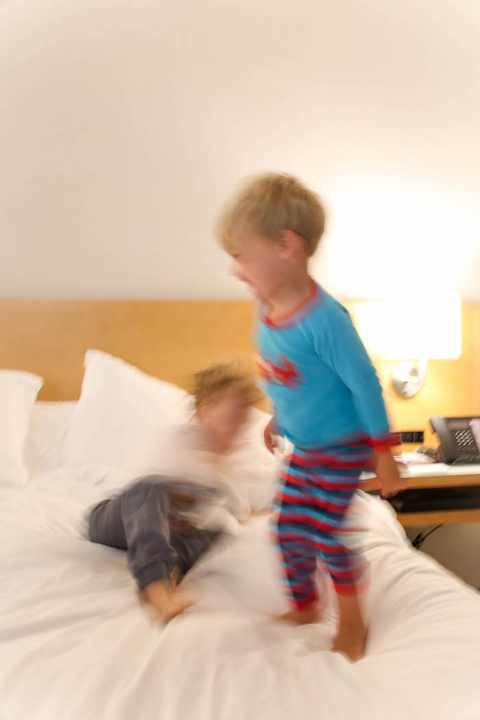 kids jumping on the bed