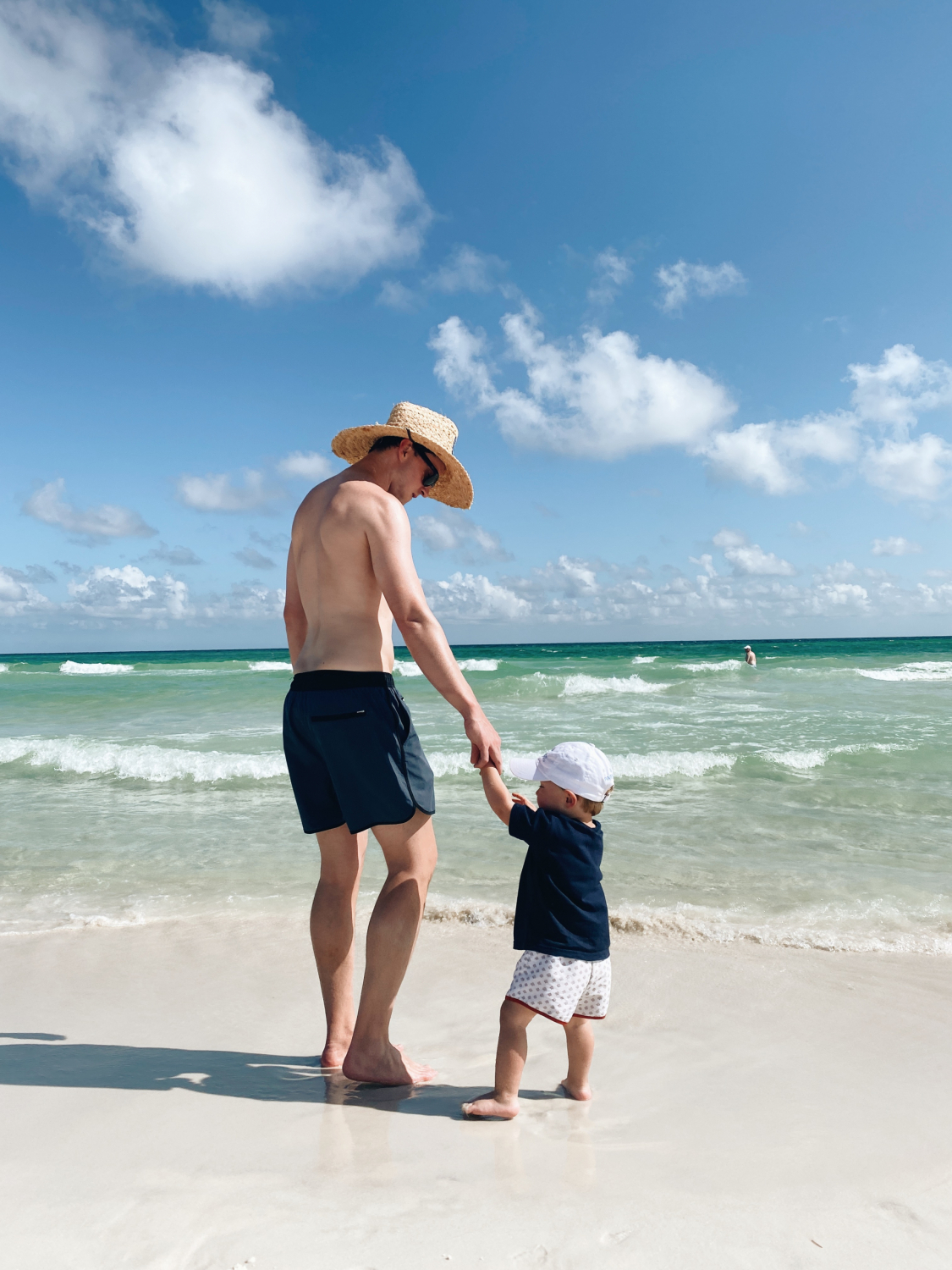 father and son on the beach