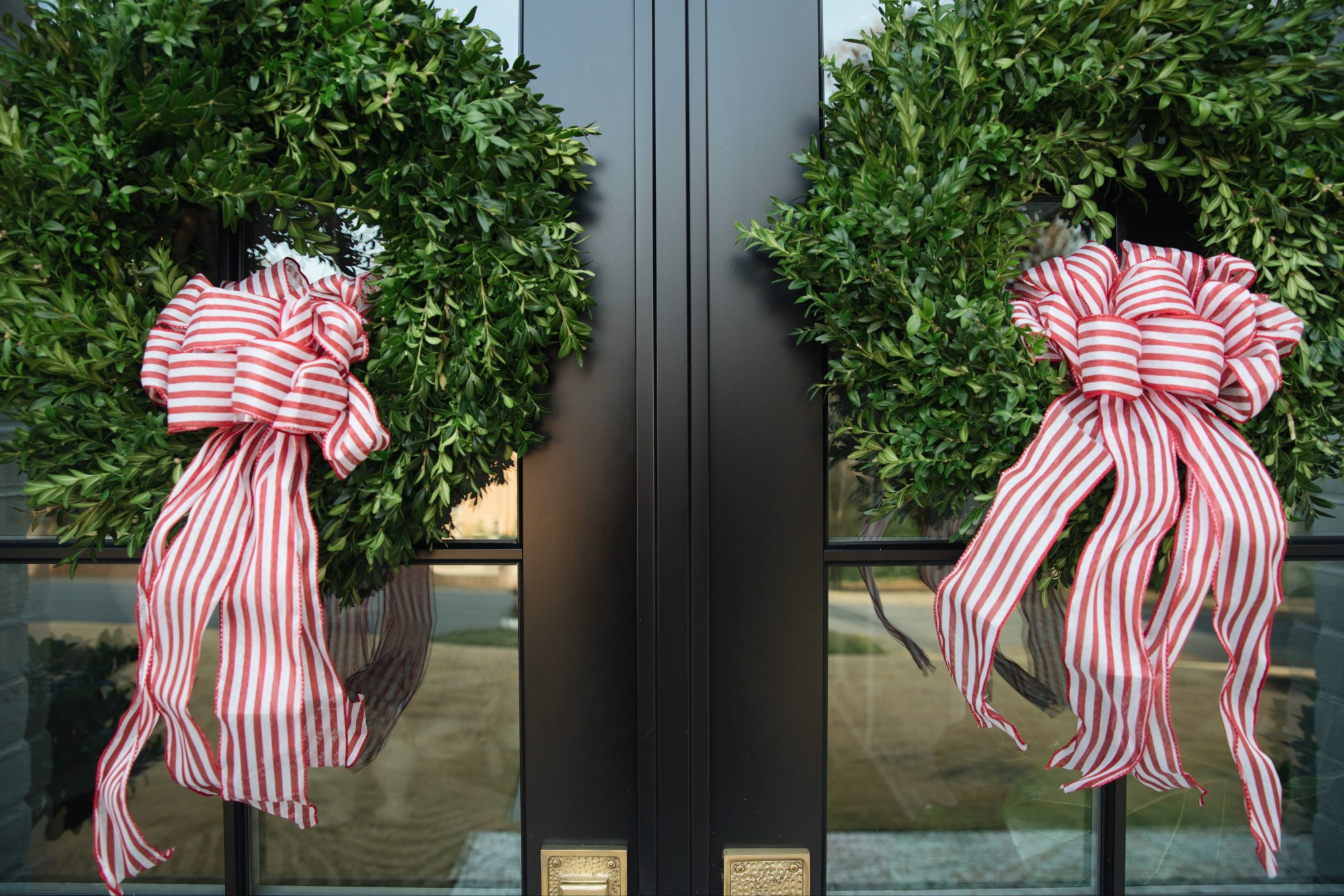 red and white striped wreath bows