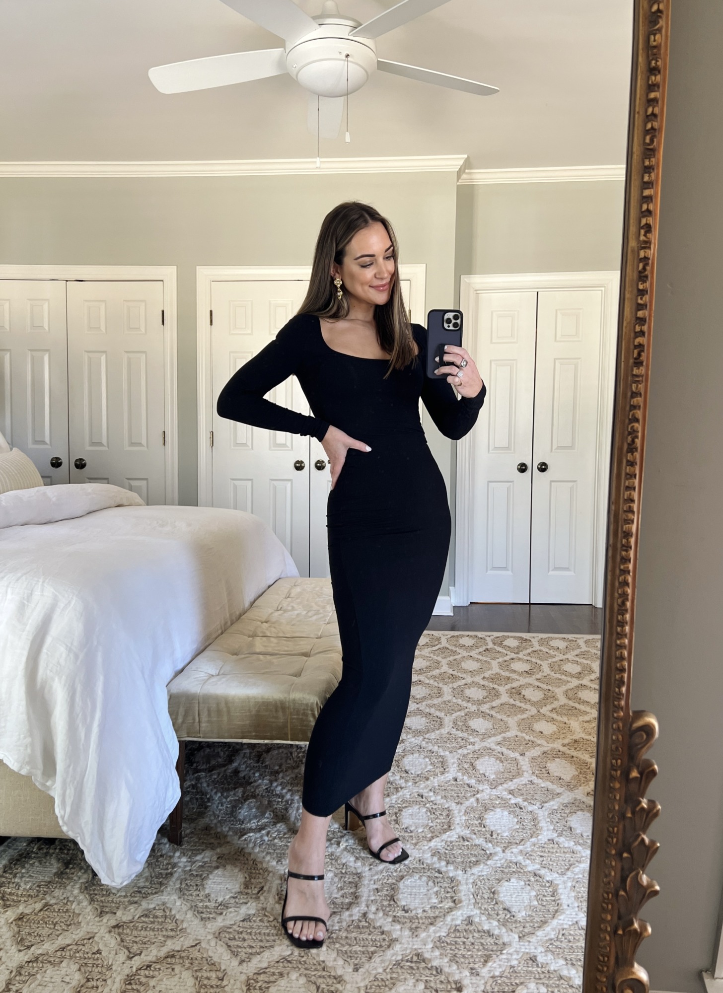 https://carriebradshawlied.com/wp-content/uploads/2023/02/black-bodycon-dress.jpg