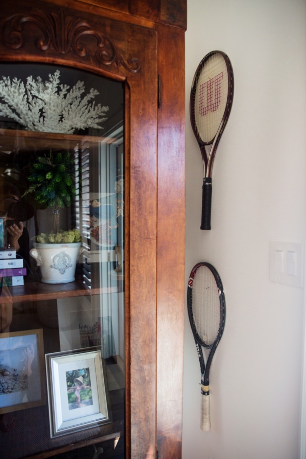 hung tennis rackets