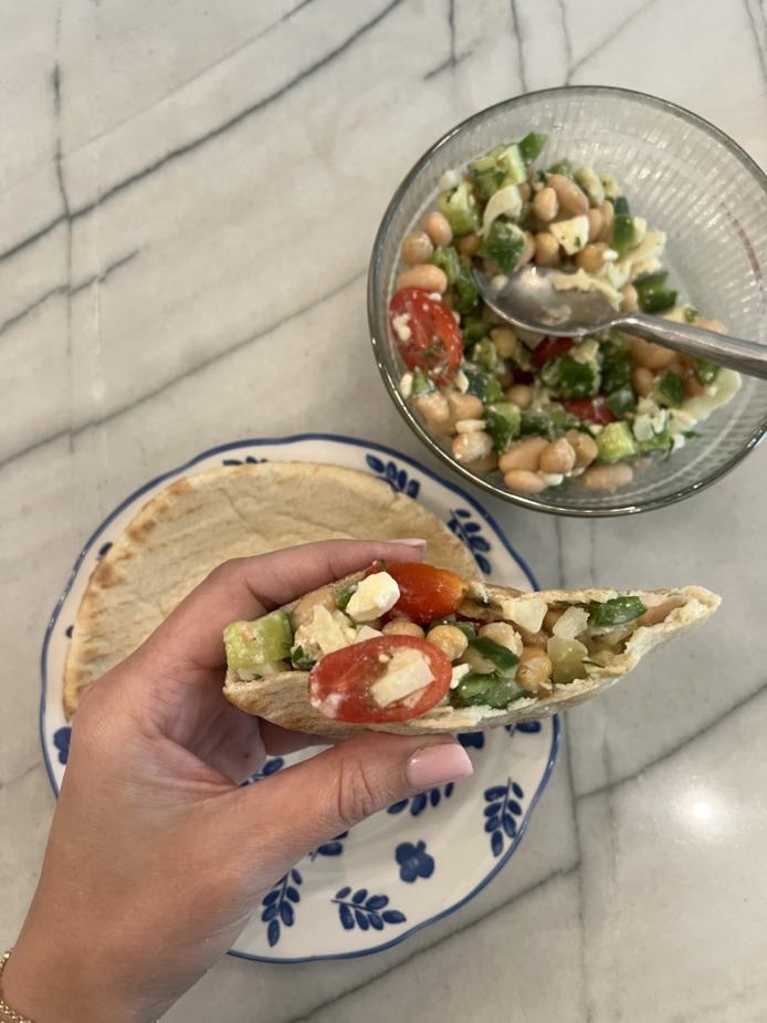 dense bean salad in pita bread